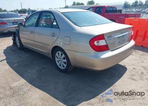 2003 Toyota Camry Xle z USA, uszkodzony, nr VIN 4T1BE30K43U693483